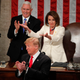 Pelosi gestures towards the congresswomen sitting in the audience when Trump gave them a shoutout.